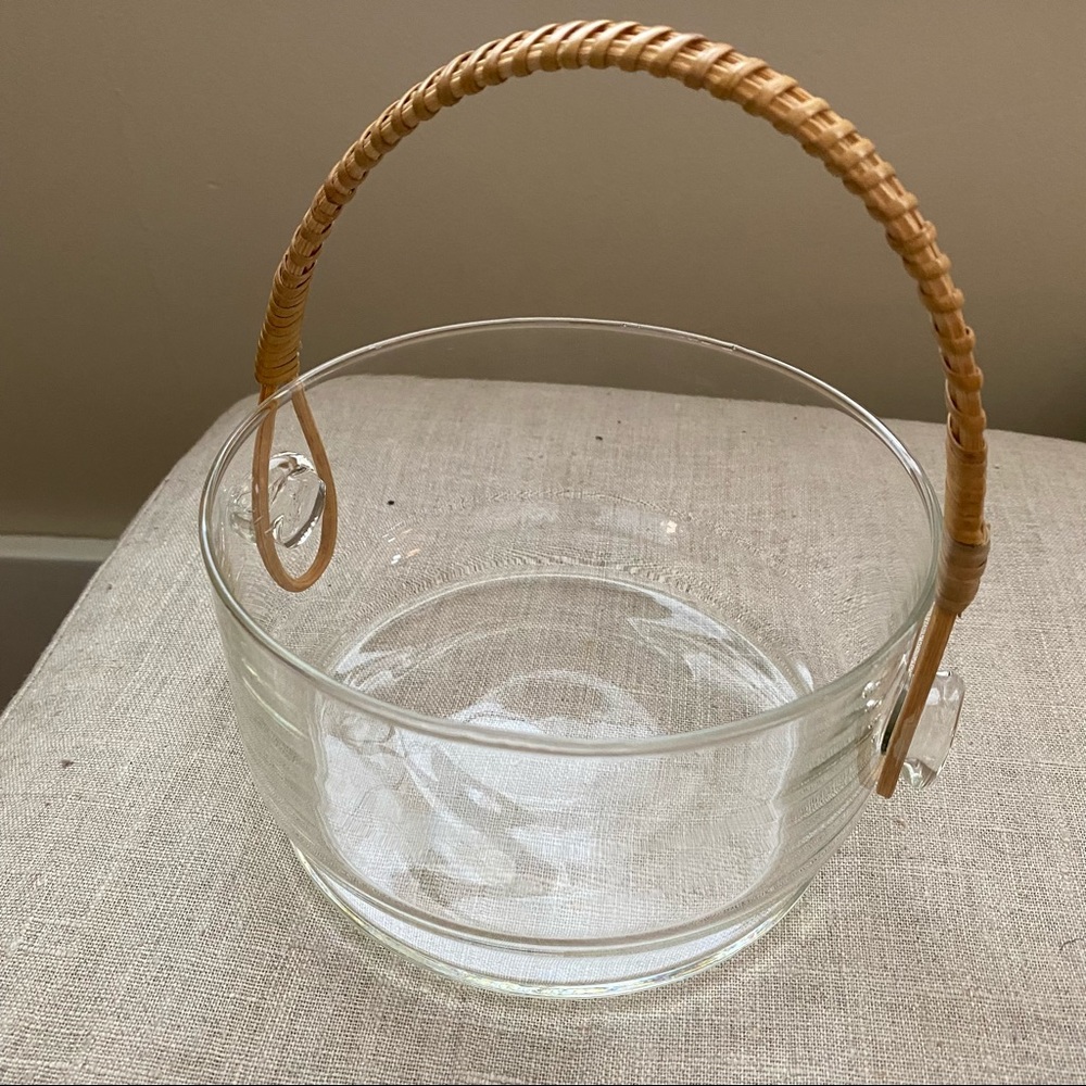 Glass bowl with woven basket handle